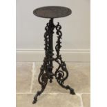 A Victorian style painted cast iron plant stand, the pierced circular top raised upon a central