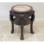 A Chinese hardwood and marble urn stand, late 19th/early 20th century, the circular top with a rouge