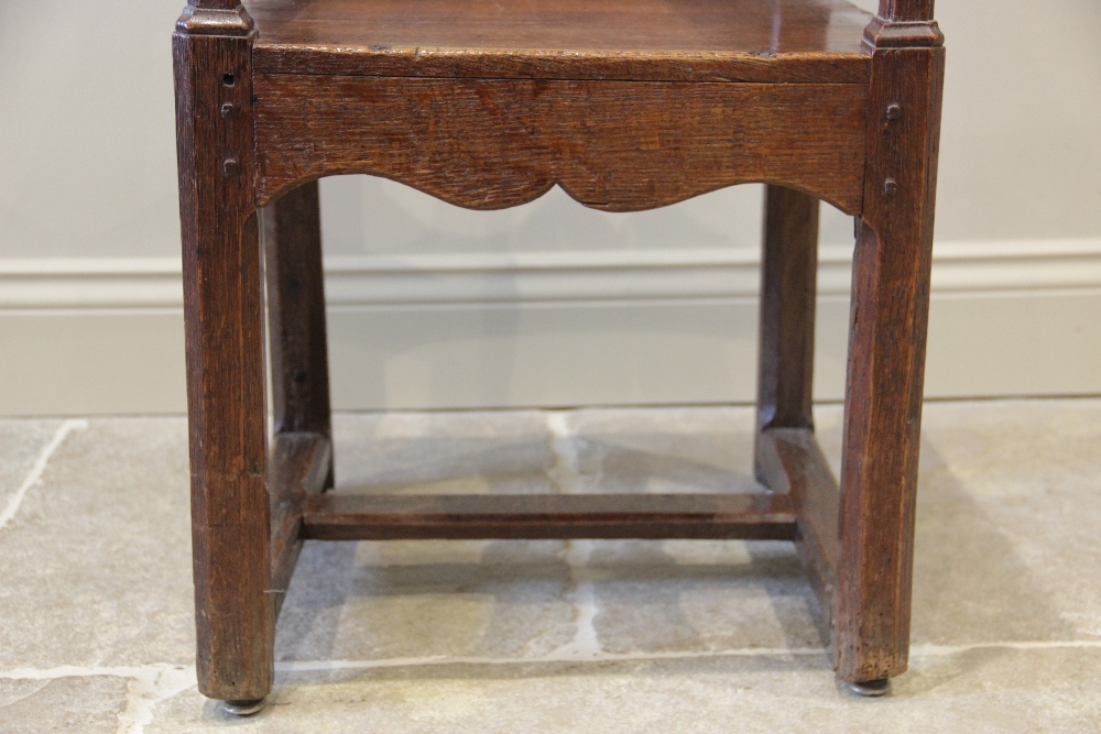 A 16th century jointed oak armchair, the two wavy back rails supported on chamfered supports - Image 4 of 14