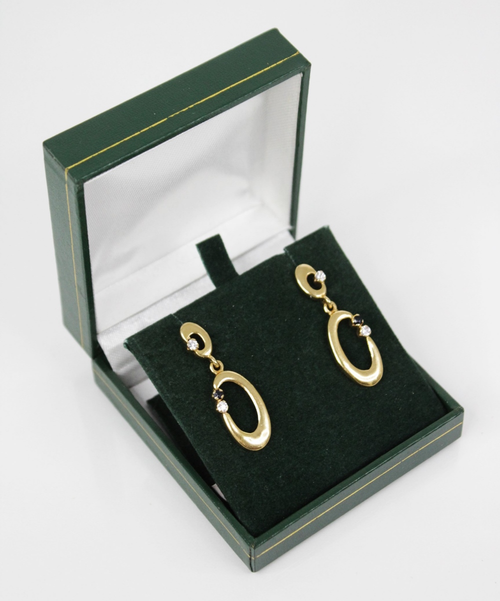 A pair of 18ct yellow gold drop earrings, each designed as a plain polished oval hoop set with a - Image 2 of 3