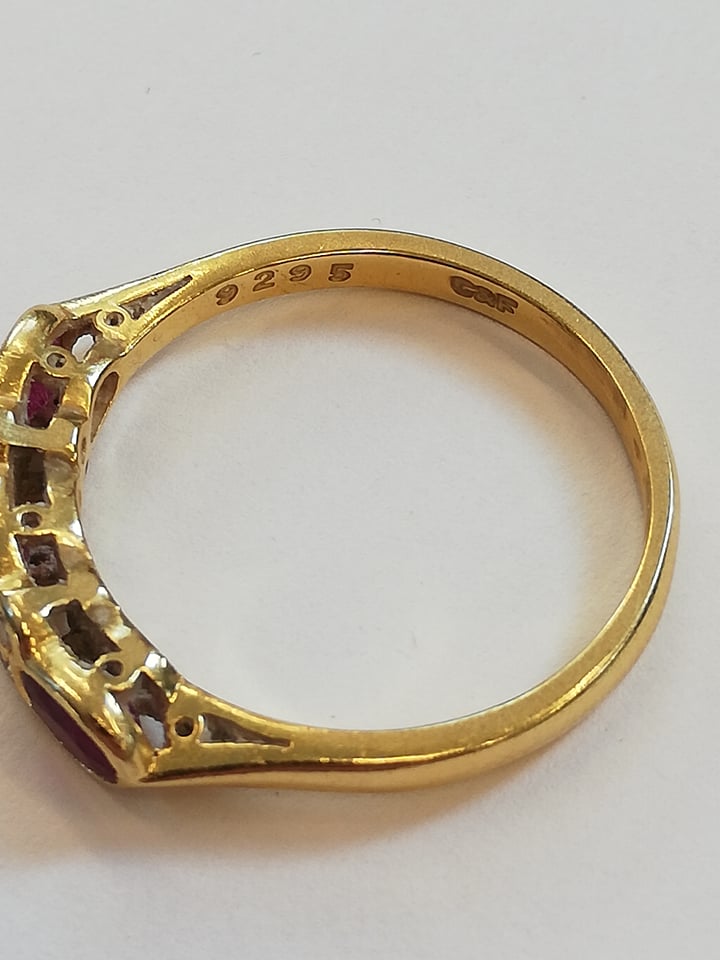 A ruby and diamond 18ct gold ring, comprising three (untested) oval mixed cut rubies, each - Image 6 of 6