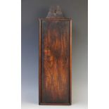 A late 18th/early 19th century elm candle box, of rectangular form, with an arched back above a