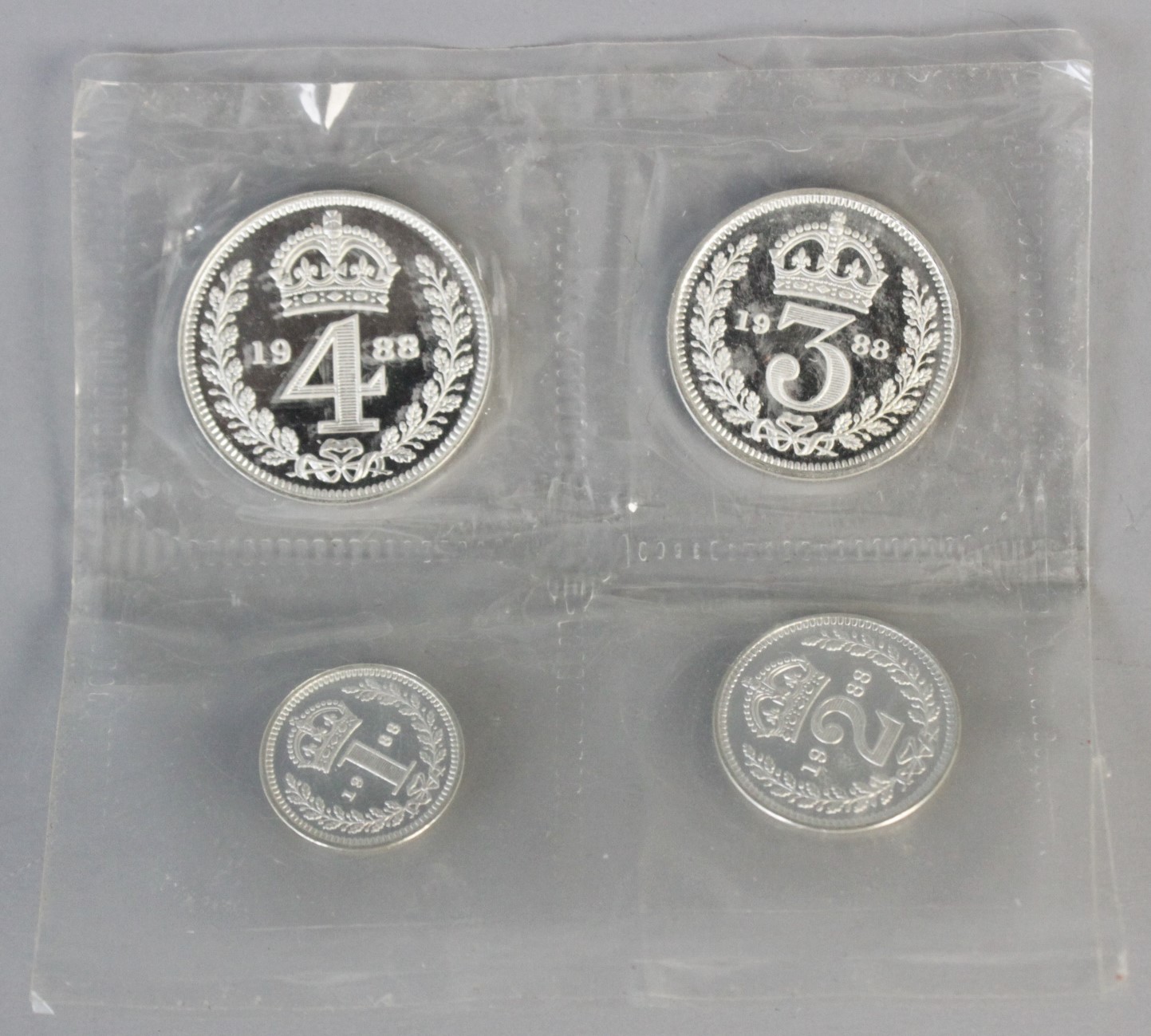 Three sealed Royal Mint sets of four Maundy money coins, each dated 1988, in a white leather - Image 4 of 5