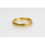 A 22ct yellow gold wedding band, marks for Birmingham 1927, ring size K 1/2, weight 4.7gms