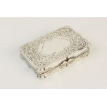 A Victorian silver snuff box by Joseph Gloster, Birmingham 1892, of rectangular form with shaped