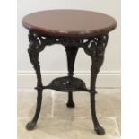 A Victorian style cast iron Britannia pub table, the circular hardwood table top raised upon three