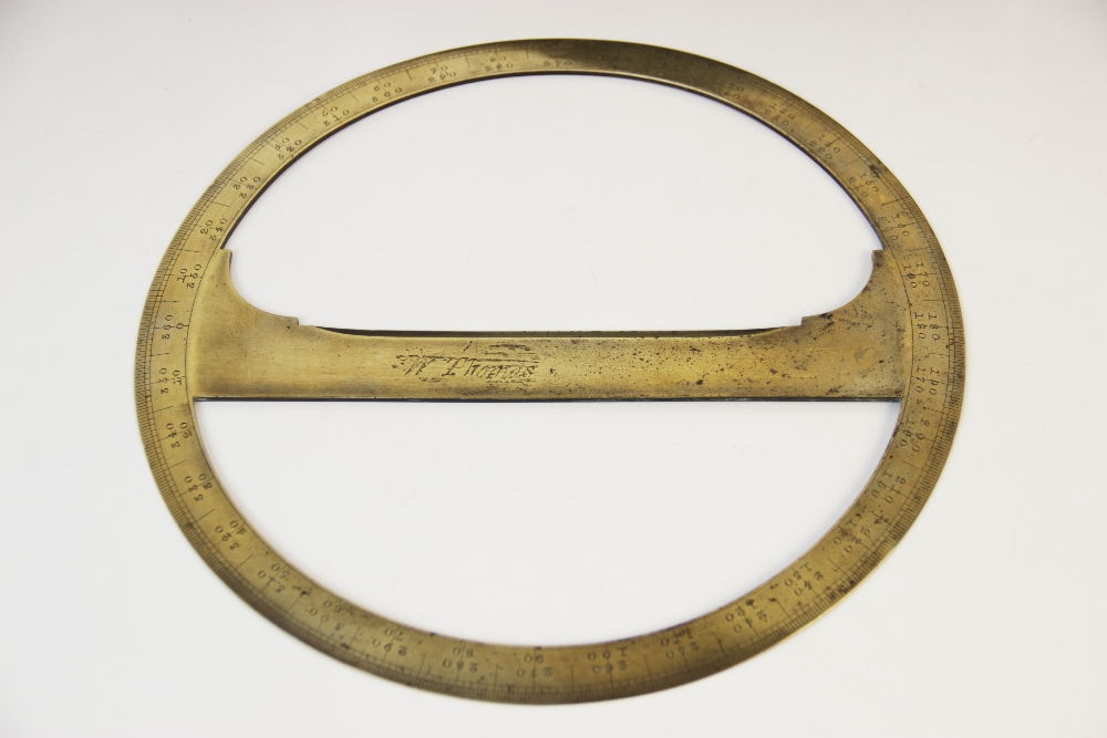 A 19th century surveyors brass protractor, the central cross beam inscribed 'W Thomas', 23cm - Image 2 of 2