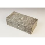 An Indian white metal wirework casket, of rectangular form with hinged cover, decorated with