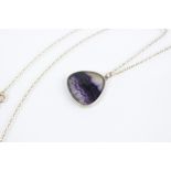 A Blue John set 9ct gold pendant on chain, the polished Blue John panel (measuring 20mm x 21mm), set