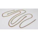 A 9ct gold rope twist chain with spring ring and loop fastening, 60.7cm long, together with a gold
