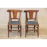 A pair of maple side chairs in the manner of Biedermeier, circa 1830, each chair with a concave