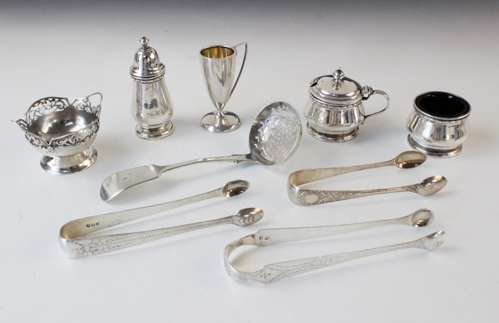 A three-piece silver cruet set, F G Richards, Birmingham 1957, comprising pepperette, wet mustard