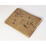 A common place book or sketchbook, late 19th/early 20th century, containing sketches, cartoons,