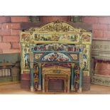 An extensive collection of miniature toy theatres, set pieces and equipment, to include; wooden