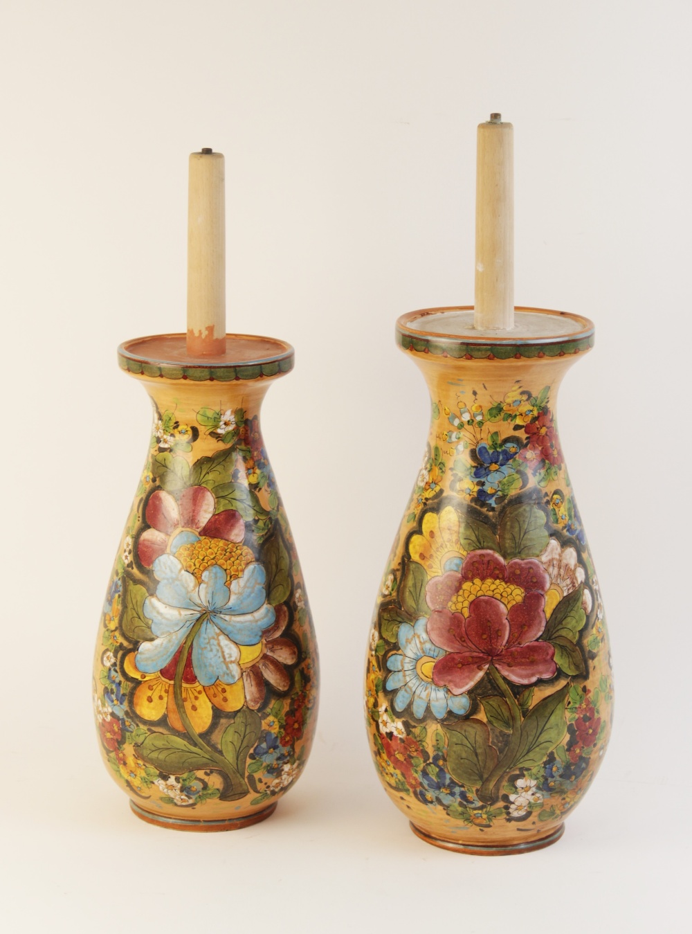 A pair of Italian painted pottery lamp bases, signed Morelli, each of baluster form and decorated