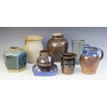 A collection of studio pottery vessels, to include; a salt glazed stoneware cream coloured vase,