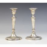 A pair of late Victorian silver candlesticks, Harrison Brothers & Howson, Sheffield 1899, each