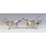 A George II silver sauce boat, London 1744 (maker?s marks worn), of typical form with scalloped