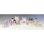 A collection of nine Staffordshire cottages, 19th century, to include two money boxes, a