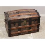 A late 19th century domed steamer trunk by F A Patterson, the slatted and leather covered trunk