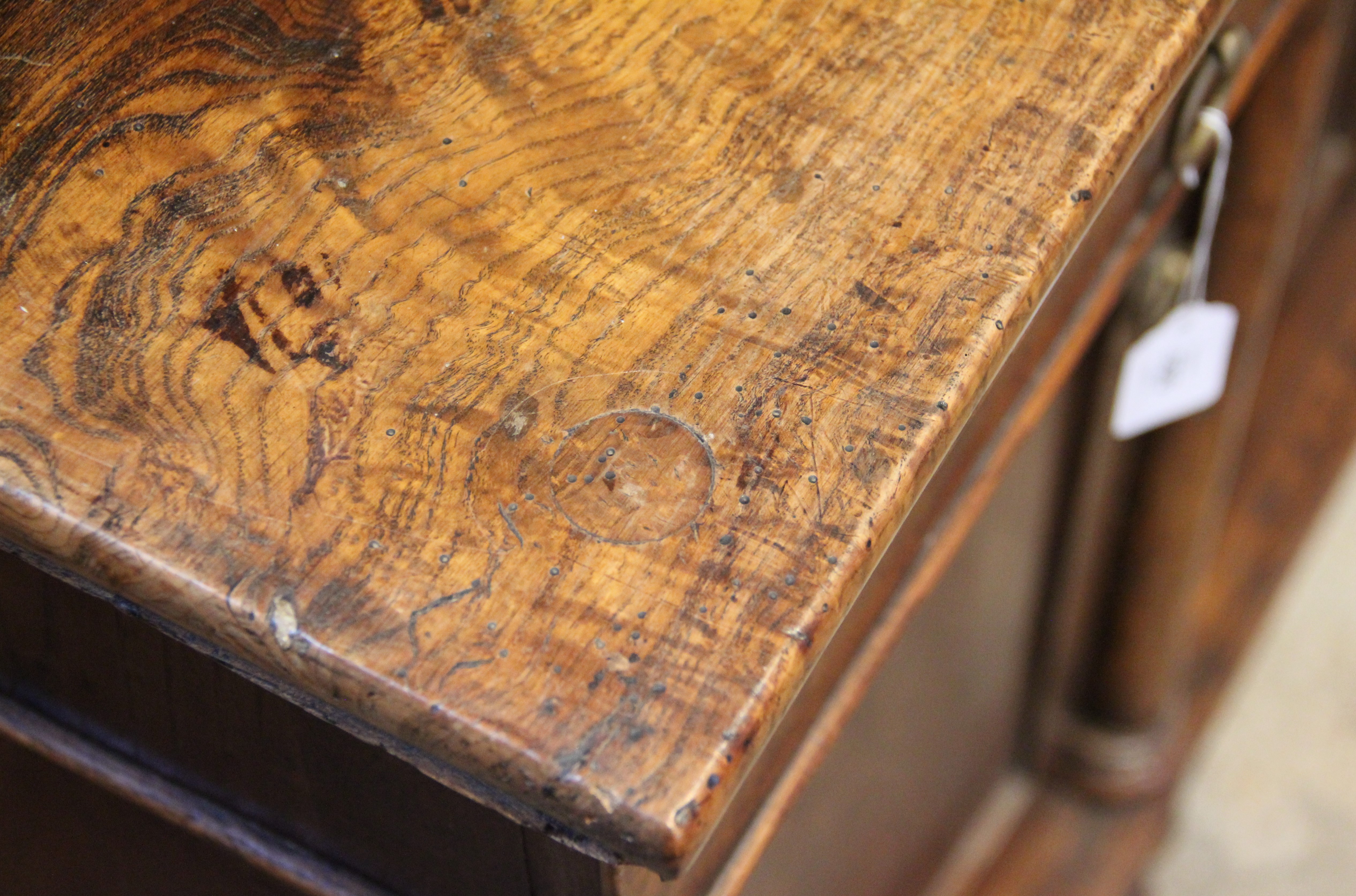 A mid 19th century elm dresser, possibly French, the high back with a moulded cornice over three - Image 3 of 15