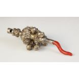 A continental rattle, teether and whistle, knopped form with embossed floral and foliate