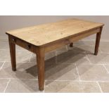 A Victorian pine scrub top kitchen table, the rectangular table top with rounded corners over