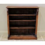 A Victorian rosewood open bookcase, the rectangular moulded top above three adjustable shelves,