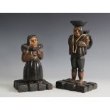 LATIN AMERICAN FOLK ART: Two carved and stained wooden figures, probably Peruvian, one modelled as a