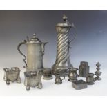 A pair of pewter salts in the manner of Archibald Knox, late 19th or early 20th century, each of