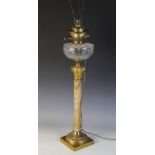 A Victorian onyx and brass oil lamp, 19th century, the polished marble column with Corinthian