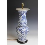 A Chinese porcelain blue and white lamp base, 20th century, the baluster shaped vase with flared