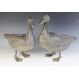 Two cast metal duck garden ornaments, each realistically modelled with feather effect chasing,