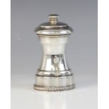 A silver pepper grinder by A Marston & Co, Birmingham 1971, of typical form with reeded border to