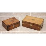 A mid 19th century mahogany campaign writing box, applied with brass corner brackets and a shaped