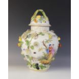 A continental porcelain frill vase, 19th century, of baluster form, decorated with painted panels