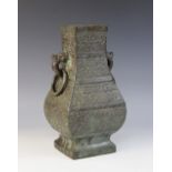 A Chinese Archaic bronze Hu vase in the Ming style, of rectangular baluster form engraved with