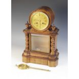 A late 19th century golden oak drum dial mantel clock, the 12cm gilt metal dial and two train