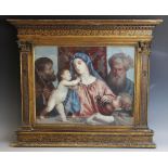An elaborate painted gesso renaissance style frame, 19th century, the cornice with continuous trompe