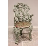A 19th century cast iron garden/patio chair, with a scrolling leaf cast back rest extending to out