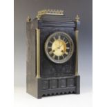 A late 19th century French slate mantel clock, the architectural case with gilt metal reeded