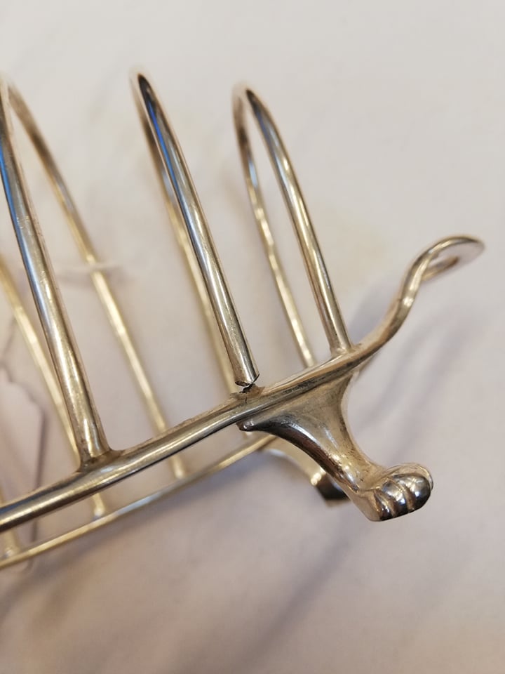 A Victorian silver six-division toast rack, Henry Wilkinson & Co, London 1893, the shaped base - Image 7 of 7