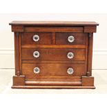 A Victorian mahogany apprentice/specimen chest, in the form of a Scottish chest, with an arrangement