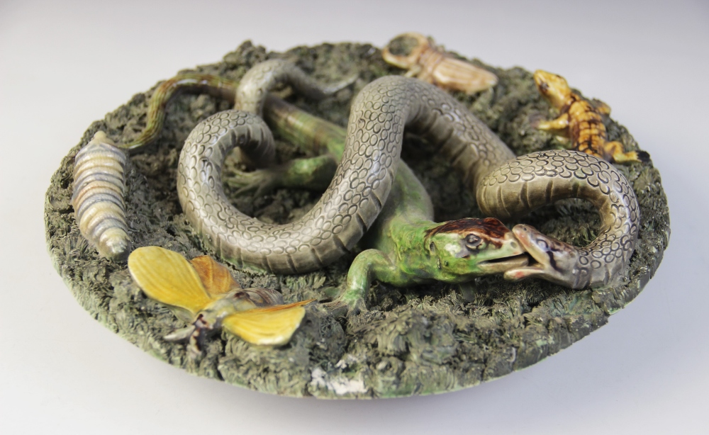 Jose Cunha Portuguese ware Palissy type plate, of circular form, decorated in relief with a snake