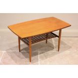 A Scandinavian teak coffee table by Albert Larson, the swelling rectangular top raised upon tapering