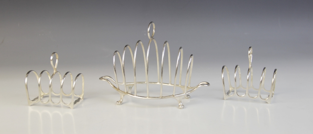 A Victorian silver six-division toast rack, Henry Wilkinson & Co, London 1893, the shaped base