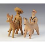 LATIN AMERICAN FOLK ART: A naïve terracotta model of a soldier mounted on horseback, painted