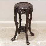 A Chinese hardwood base stand, late Qing/Republic period, the moulded circular top above a