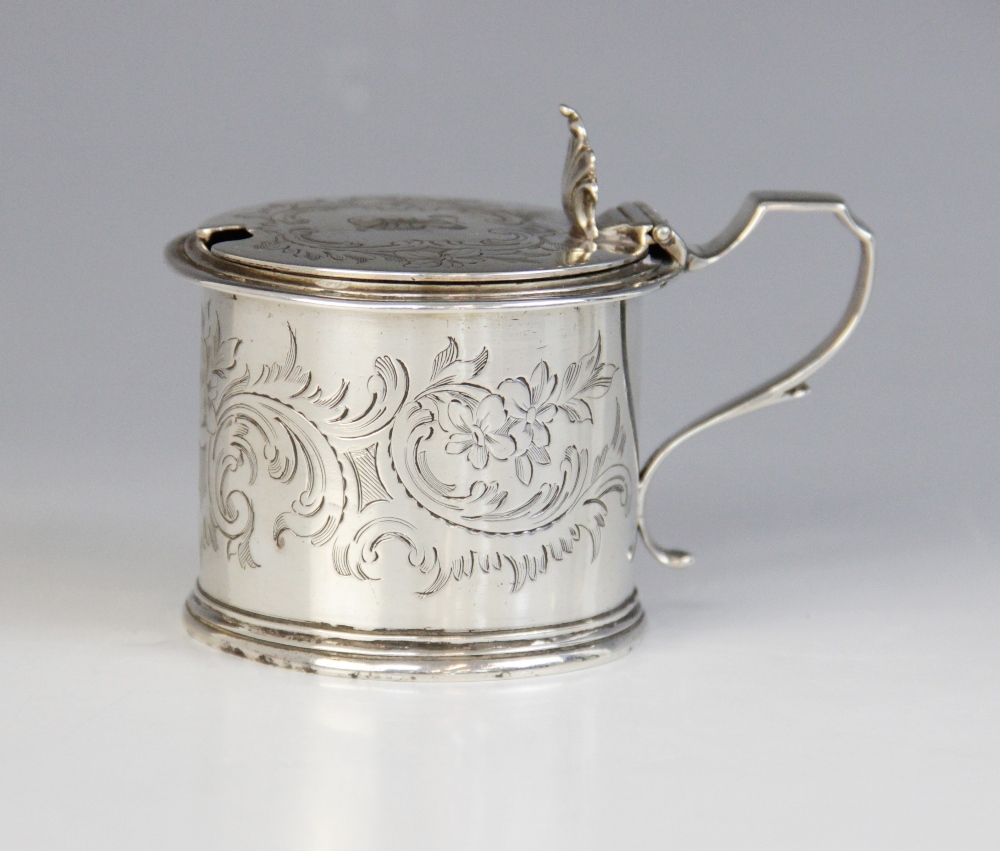 A Victorian silver wet mustard, George John Richards, London 1854, of drum form with scrolling