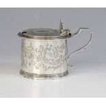 A Victorian silver wet mustard, George John Richards, London 1854, of drum form with scrolling